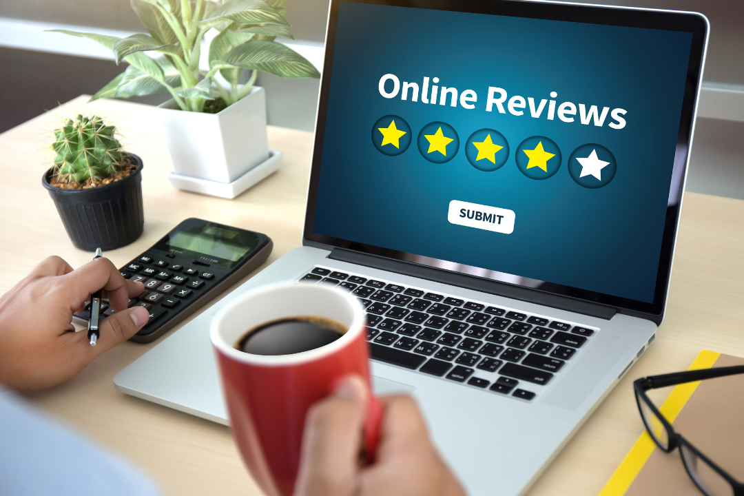 A small business owner updating their online profile and managing customer reviews to improve local SEO visibility.